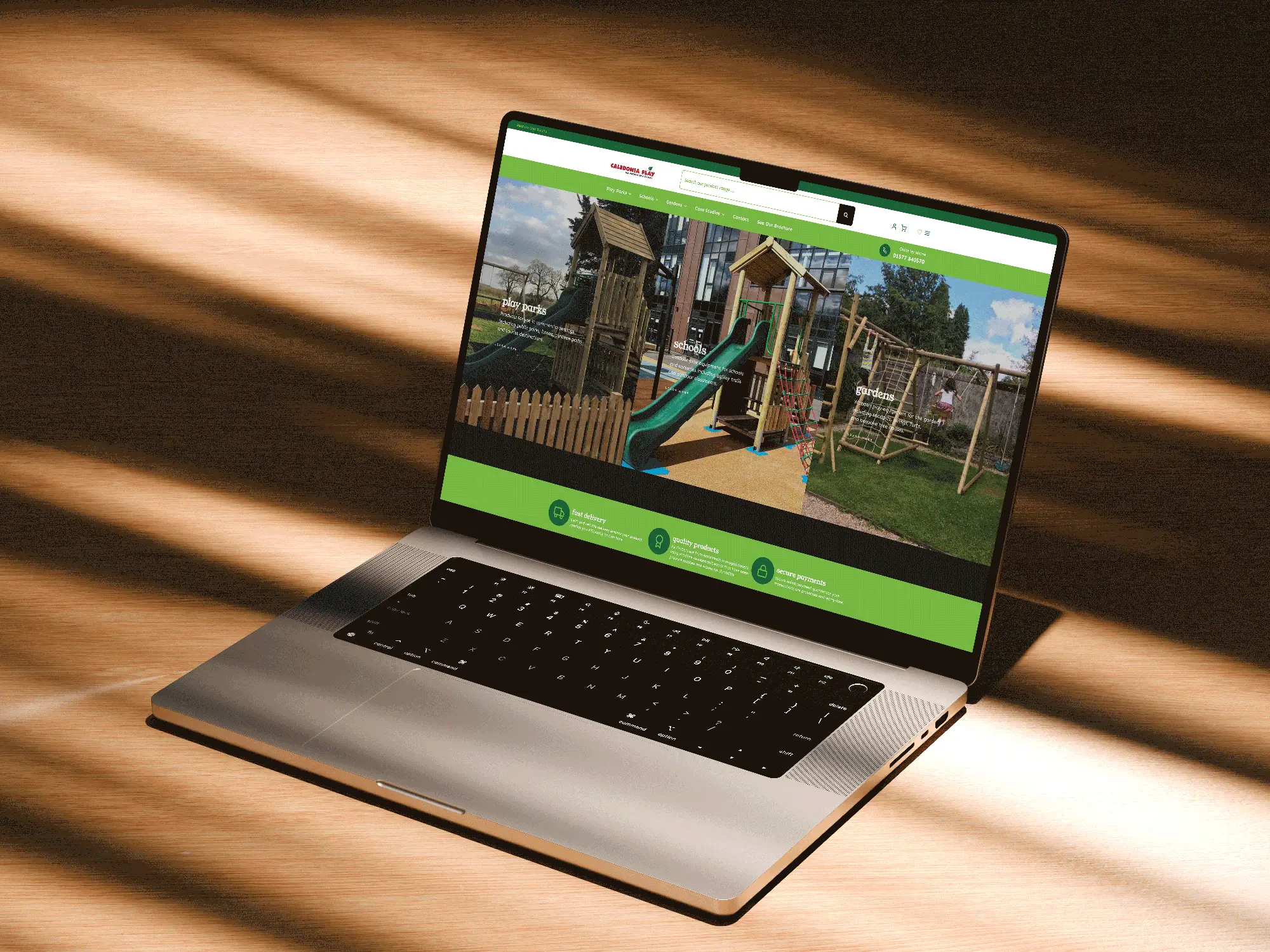 Laptop displaying the Caledonia Play website homepage