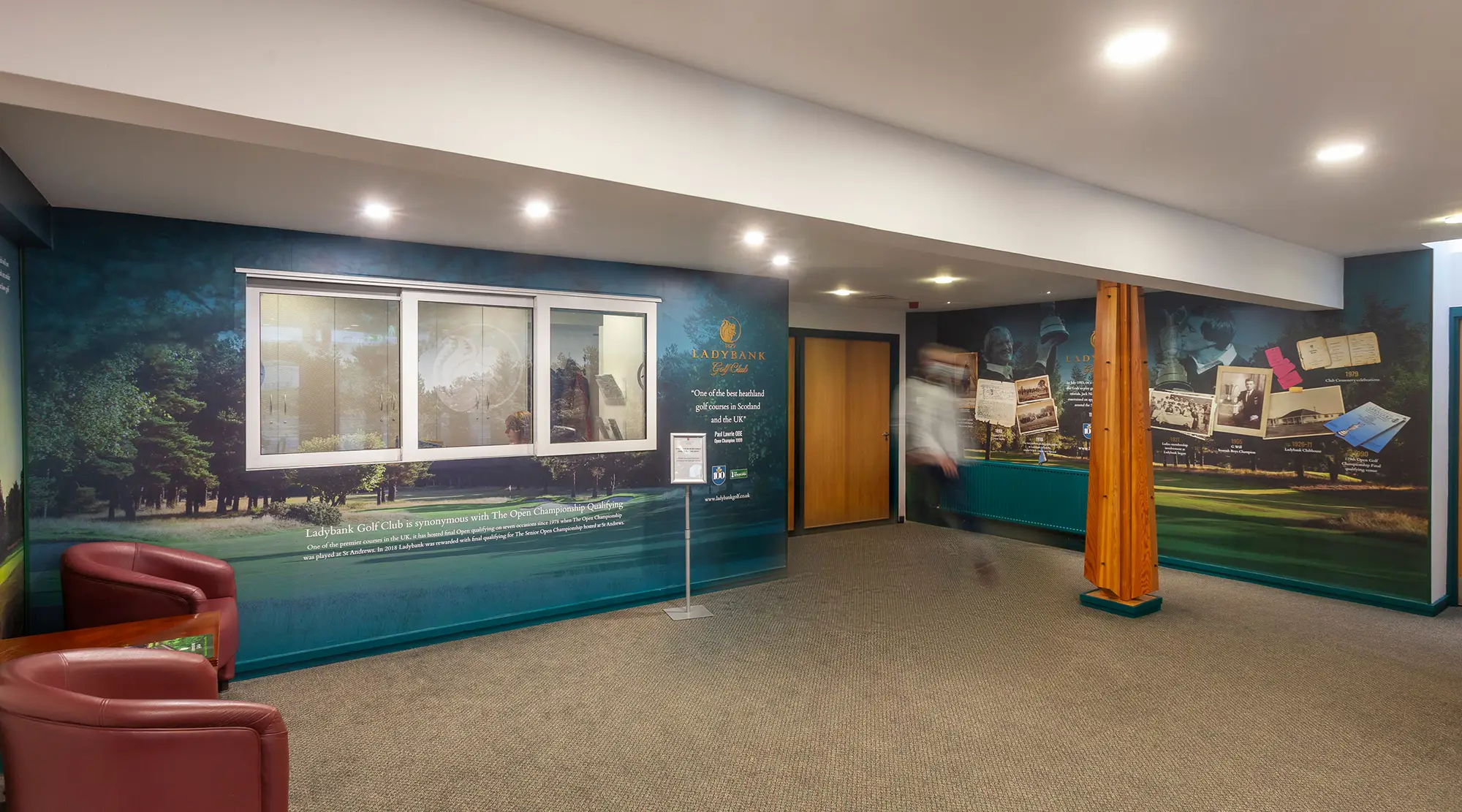 Ladybank Golf Club – clubhouse interior Ladybank Golf Club clubhouse interior showing branded heritage wall graphics along the corridor