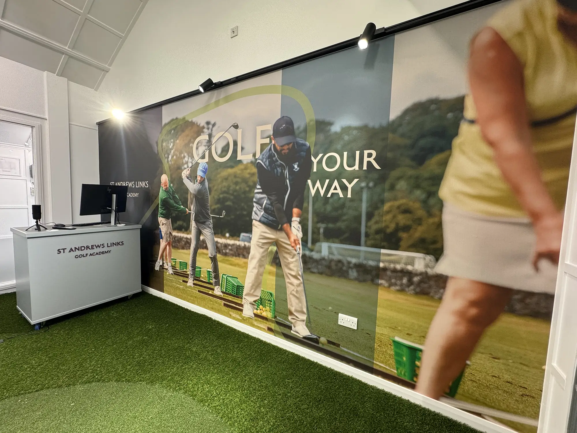St Andrews Links Golf Academy interior with large-format 'Golf Your Way' display graphics