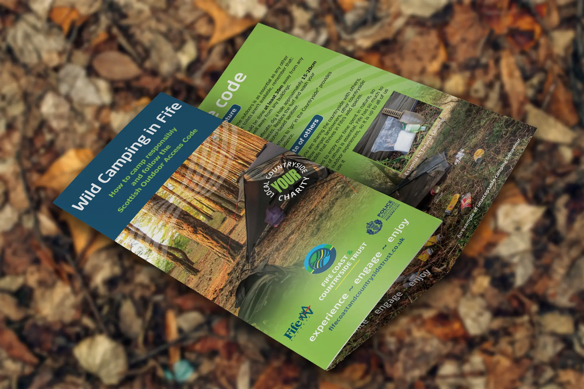 Wild Camping in Fife leaflet designed for Fife Coast and Countryside Trust, laid on autumn leaves